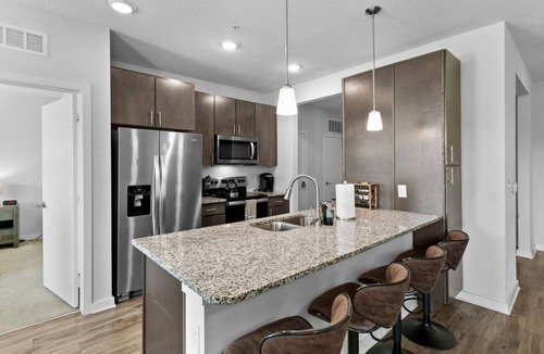 Deerwood Apartment | Poolside Bliss: Stylish 1BR Unit in Resort Complex