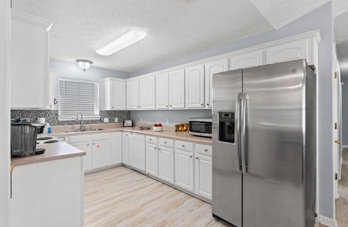 Panama City Beach House | Poolside Cabana by Book That Condo