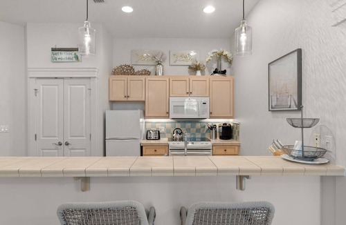 Baytowne Wharf Condo | Poolside Condo w/GOLF CART! Tram to Beach. Steps to Pool and Baytowne Wharf!