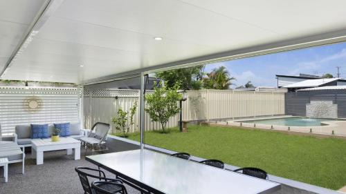 Berkeley Vale House | Poolside Family Retreat By Holidayco
