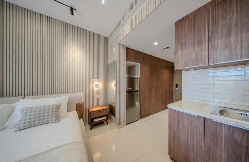 Sharjah Apartment | Poolview Studio Apartment in Zuhour Uptown AlZahia