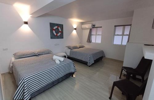 Punta Hansa Hotel | Posada Smith Town