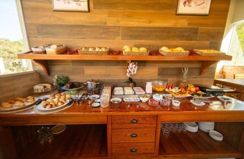 Jardim Andira Hotel | Pousada Estilo de Campos