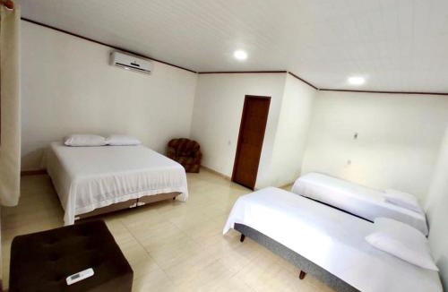 Caravelas House | Pousada Oliveiras