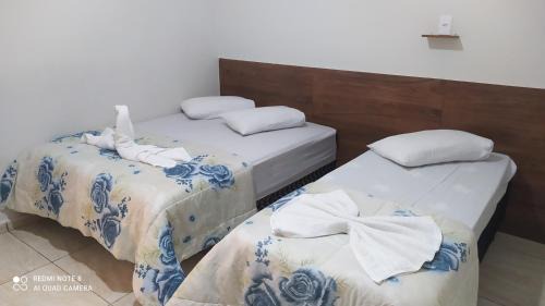 Aparecida House | Pousada Quarto com tv,ar,frigobar,wifi e garagem