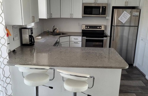 Admiral Estates Condo | Poverty Beach is right across the street from this newly renovated bright Beach Condo.