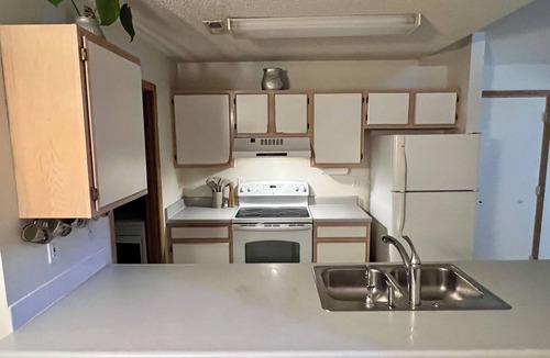 Lawrence House | Practical Zen: 4-bedroom 5-bed 2-bath close to everything, flexible, cookies.