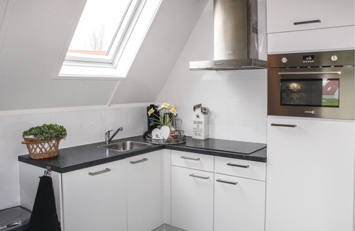 Den Oever House | Practically furnished vacation home located on the edge of a vacation park near the Ijsselmeer (3 km