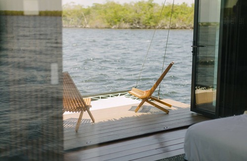 Key Largo Village House | Premium Floating Bugalow by Stay Ombi in the Keys with Stunning Ocean Views.