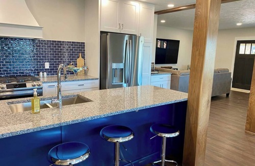 Escanaba House | Pristine Home Perfect for Family Bay Views Luxe Chef’s Kitchen Ludington Park