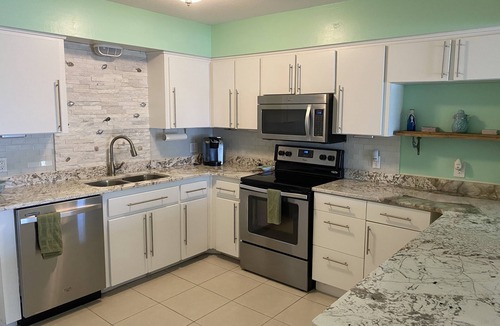 New Smyrna Beach House | Pristine Tropical Getaway Townhouse Across Street from the Beach!