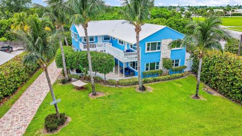 Fort Pierce Shores Villa | Private Beach Compound - 4 Units - Sleeps 30 - Pets OK