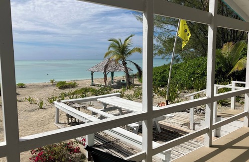Bahama Palm Shores Cottage | Private Beach House on Casuarina Bonefish Beach with Motorboat for Rent