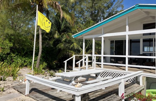 Bahama Palm Shores Cottage | Private Beach House on Casuarina Bonefish Beach with Motorboat for Rent