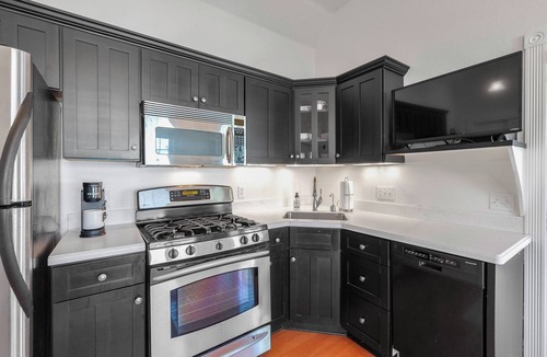 Elkhart Lake Condo | Private Beach, Pool & Full-Kitchen