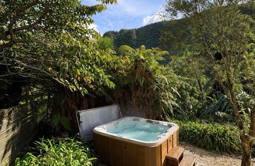 Upper Hutt Villa | Private countryside retreat with outdoor spa, river access and orchard