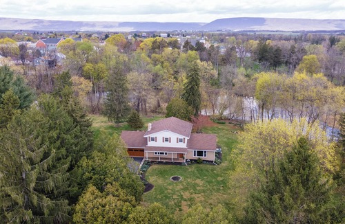Newville House | Private CREEKside fireplc pool table KING bed patio BBQ AC WIFI nature lovers