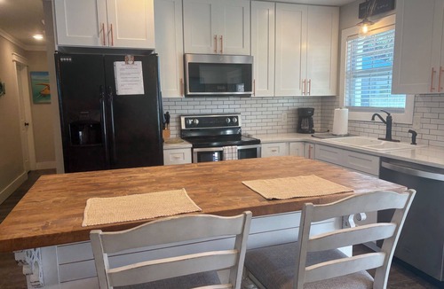 Parker House | Private dock with slips. 2 miles to Tyndall gate. Outdoor photos 1 block away