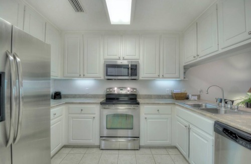 Demere Park Condo | Private Elevator 5 Balconies Pool St. Simons Rental