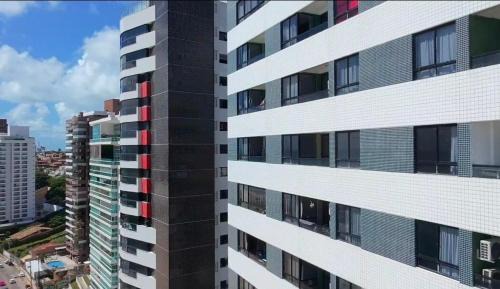 Areia Preta Apartment | Private, Fully Equipped Suite, Sea View, with Garage