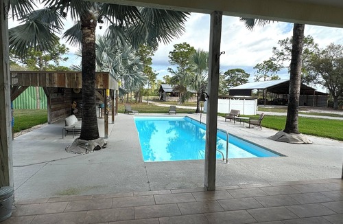 Lehigh Acres House | Private & Gated 4-bedroom house with 10.6 Acres, Game Rooms, Pool, Hot Tub, Bar