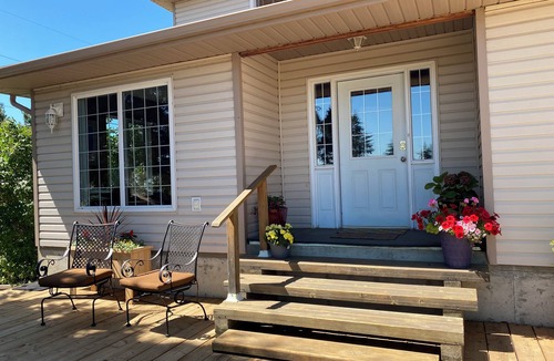 Ma-Me-O Beach House | Private guest suite with a king bed, in a country home, minutes from Wetaskiwin.