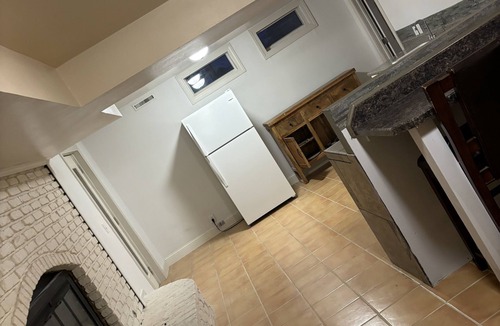 Cedar Rapids House | Private In town quiet retreat 12+ Downstairs Bonus Kitchen and walkout quarters.