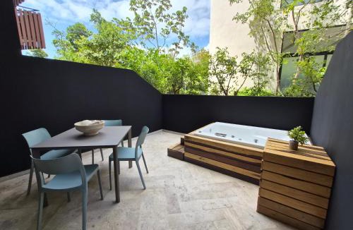 Playa Paraiso Apartment | Private Jacuzzi in Tulum Hotel Zone - Sea View Rooftop Pools & Beach