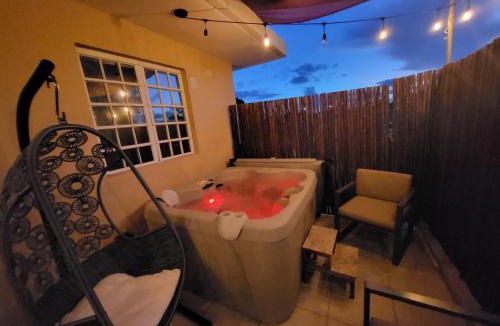 Bucana Apartment | Private Jacuzzi Oasis with Mountain Views and FREE Parking