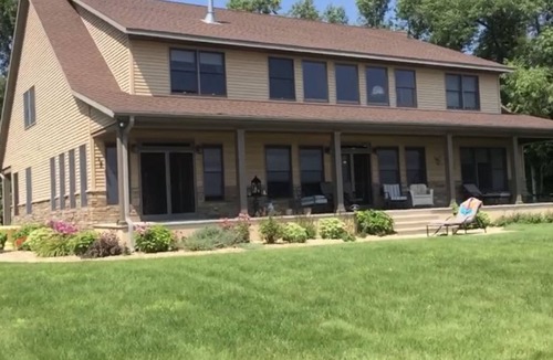Ingalls House | Private lakefront home with 1,200 feet of sandy beach. A year-round retreat.