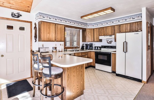 Three Lakes House | Private lakeside cabin on the shore of Virgin Lake with a large deck and firepit