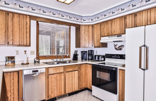 Three Lakes House | Private lakeside cabin on the shore of Virgin Lake with a large deck and firepit