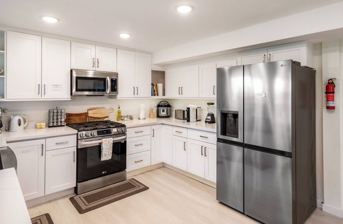 Leschi House | Private Leschi Suite with Views, Patio & Sport Court.