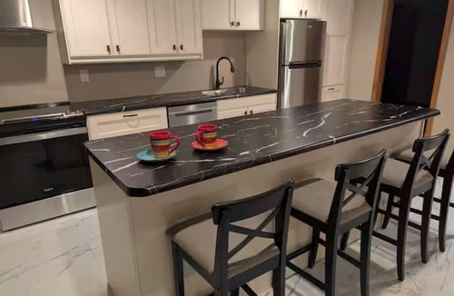 East Lansing Apartment | Private Luxury Suite with Hot Tub Near MSU & Hospitals