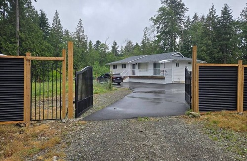 Regional District of Nanaimo House | Private Master Bedroom in a Farmhouse