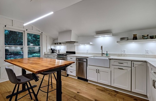 Highlands Hills House | Private, Modern, Unique freestanding fireplace, Outdoor seating