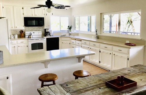Lotus House | Private River and Mountain Views from Cozy Cabin, Covered Deck and Beach!