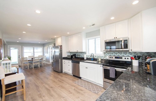 Grasonville House | Private Riverfront Home with Hot Tub, Kayaks, Paddleboards and Riverside Firepit