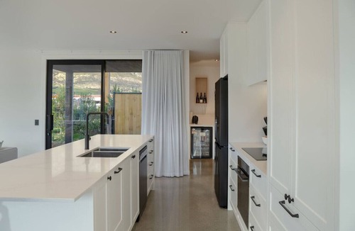 Kawarau Falls House | Private Spa with Remarkables & Coronet Views