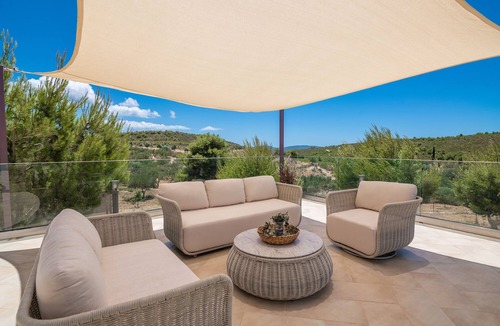 Agia Marina Villa | Private stone villa with heated pool & large outside area, set atop on hillside