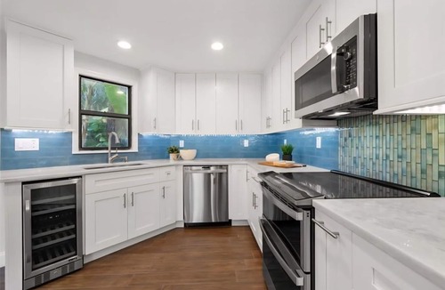 Tarpon Springs House | “Private Tropical Oasis w/Resort Pool, Tiki Bar & Hot Tub"