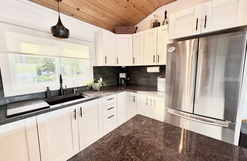 Trent Lakes Cottage | Private Waterfront Point |Surrounded by Water, Fire Pit & Kayaks Included