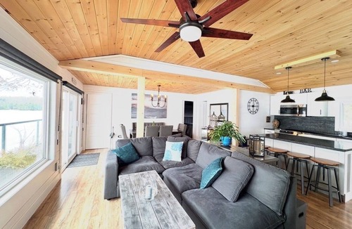 Trent Lakes Cottage | Private Waterfront Point |Surrounded by Water, Fire Pit & Kayaks Included
