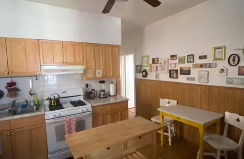 Irving Park Apartment | Pup Friendly Apartment with Fenced Backyard