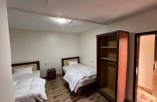 Kafrat al Jabal Hotel | pyramids view inn To Pyramids , 4-bedroom hotel with AC and WiFin tranquil Giza