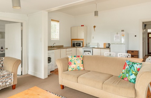 Ngakawau House | Quaint beachfront cottage. Sunny deck and views.
