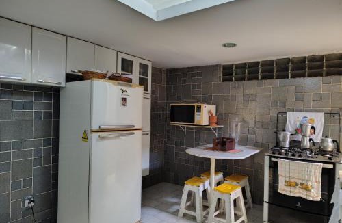 Pitimbu House | Quarto com 3 camas