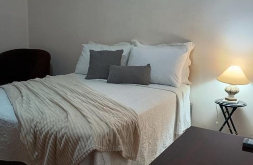Estancia Velha House | Quarto com banheiro privativo em Estância Velha