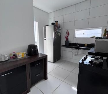 Bacabal House | Quarto Executivo em Bacabal-MA - TV, Frigobar e Ar-condicionado