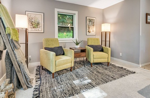 West Hartford House | Quechee Lakes home on three acres - trail access, fireplace, AC - dog-friendly
